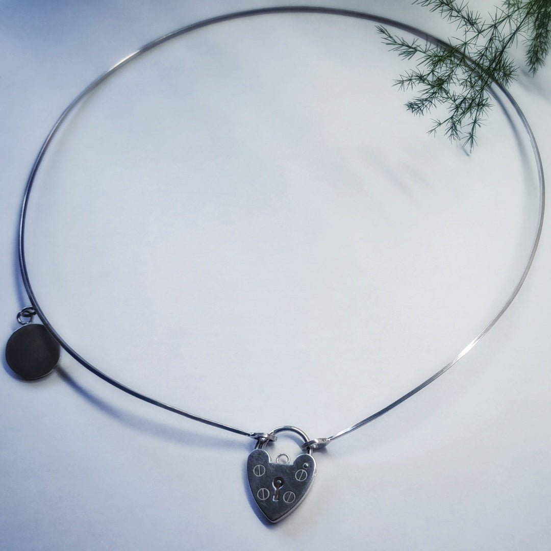 Minimalist Silver necklace with heart lock