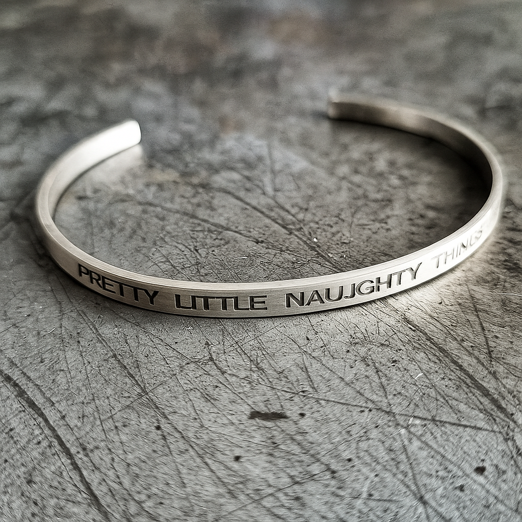 Silver bracelet with engraved text