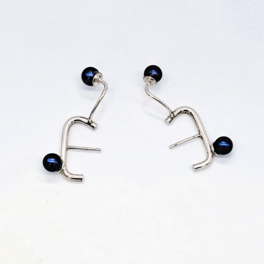 Silberohrringe mit Perlen