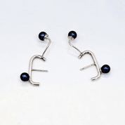 Silberohrringe mit Perlen