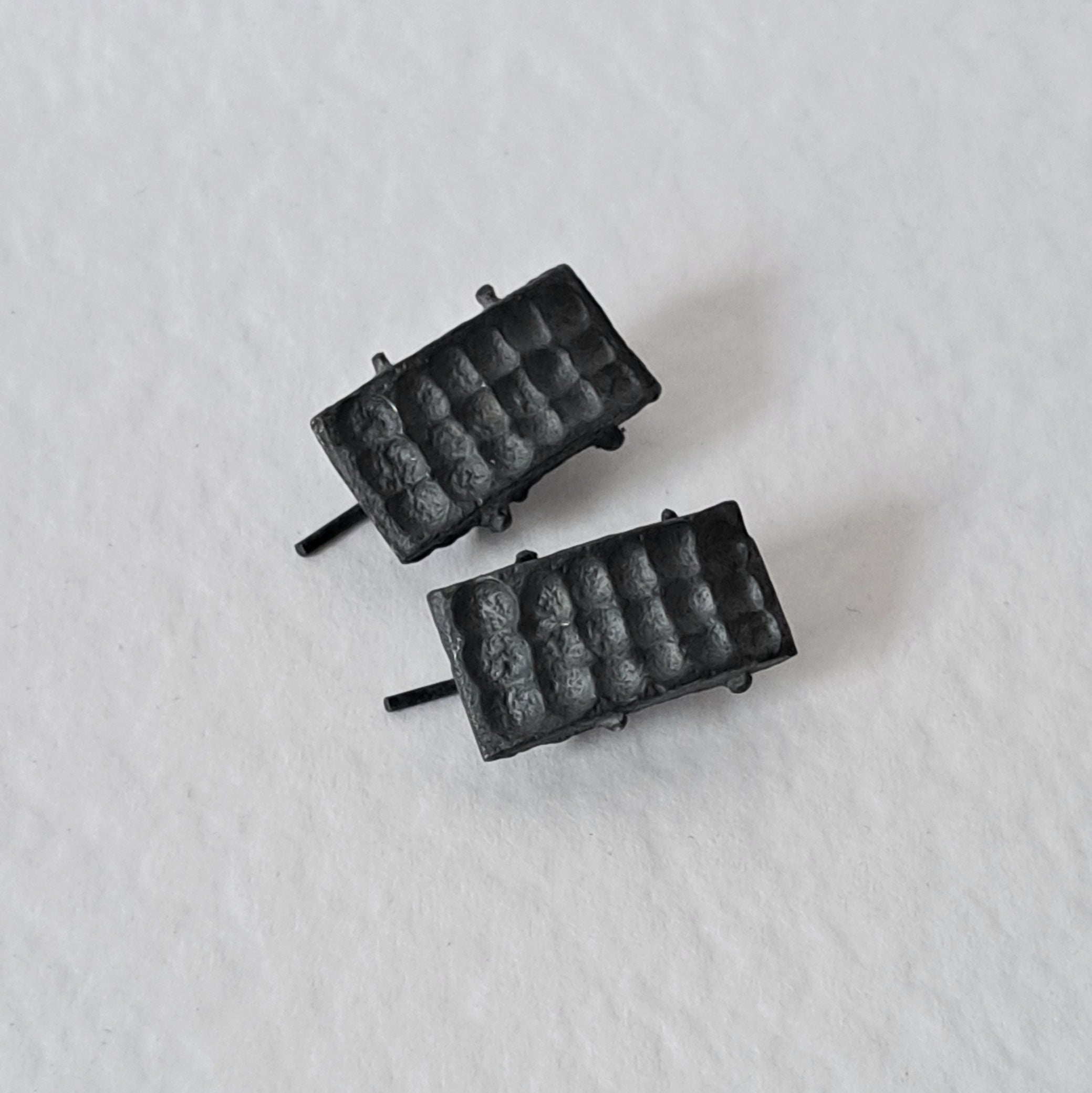 Handcrafted black oxidised sterling silver sculptural stud earrings from the SONYJA MINI Collection inspired by contemporary architecture.