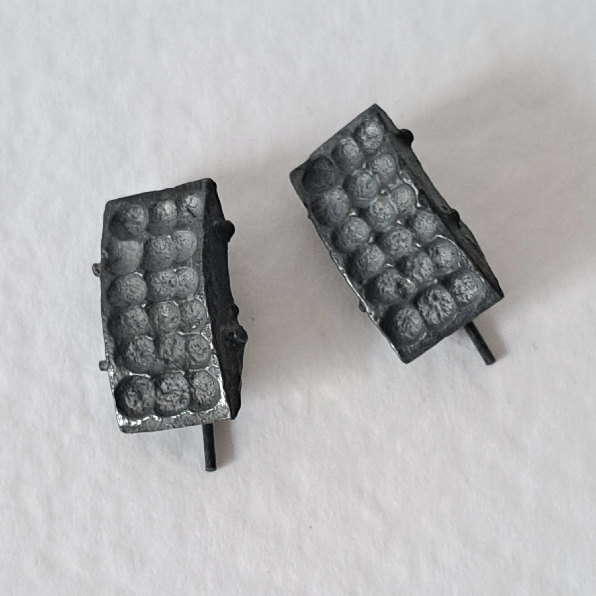 Handcrafted black oxidised sterling silver sculptural stud earrings from the SONYJA MINI Collection inspired by contemporary architecture.