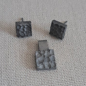 Handcrafted black oxidised sterling silver jewellery set featuring a sculptural pendant and matching stud earrings inspired by architecture and the SONYJA MINI Collection.