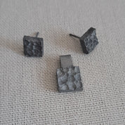 Handcrafted black oxidised sterling silver jewellery set featuring a sculptural pendant and matching stud earrings inspired by architecture and the SONYJA MINI Collection.