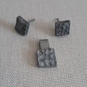 Handcrafted black oxidised sterling silver jewellery set featuring a sculptural pendant and matching stud earrings inspired by architecture and the SONYJA MINI Collection.