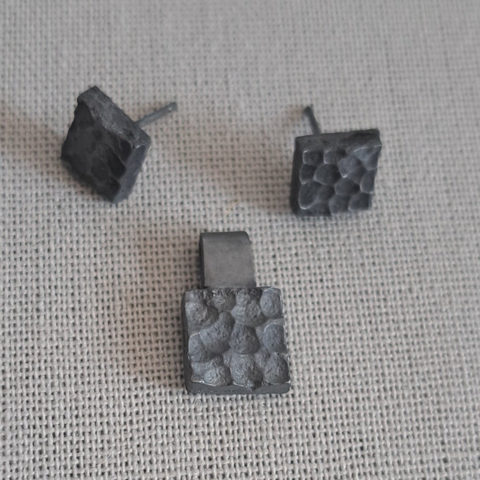 Handcrafted black oxidised sterling silver jewellery set featuring a sculptural pendant and matching stud earrings inspired by architecture and the SONYJA MINI Collection.