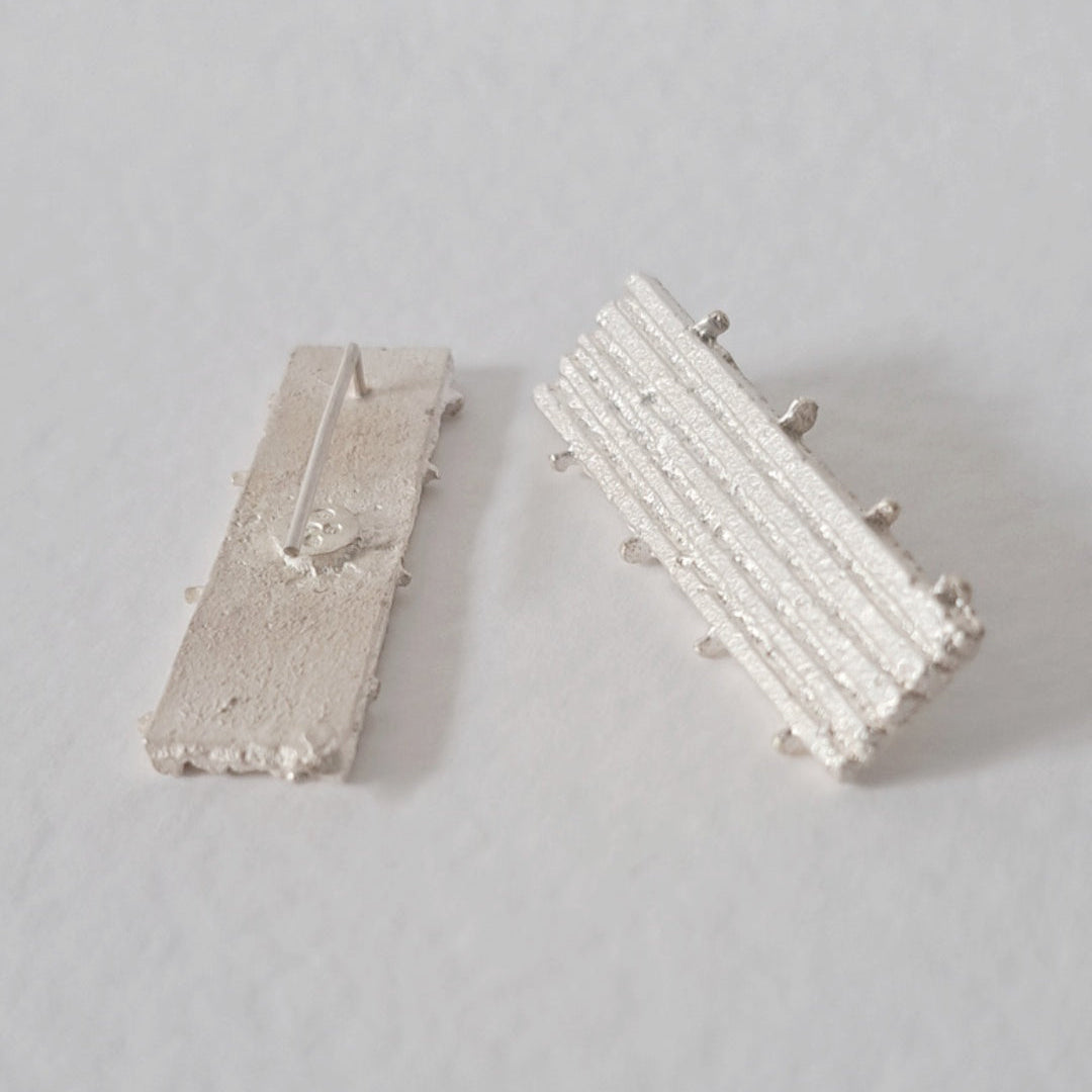 Pair of silver earrings 