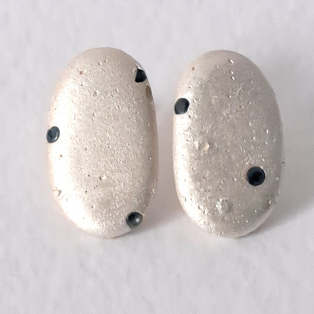 Textures silver earrings with sapphires