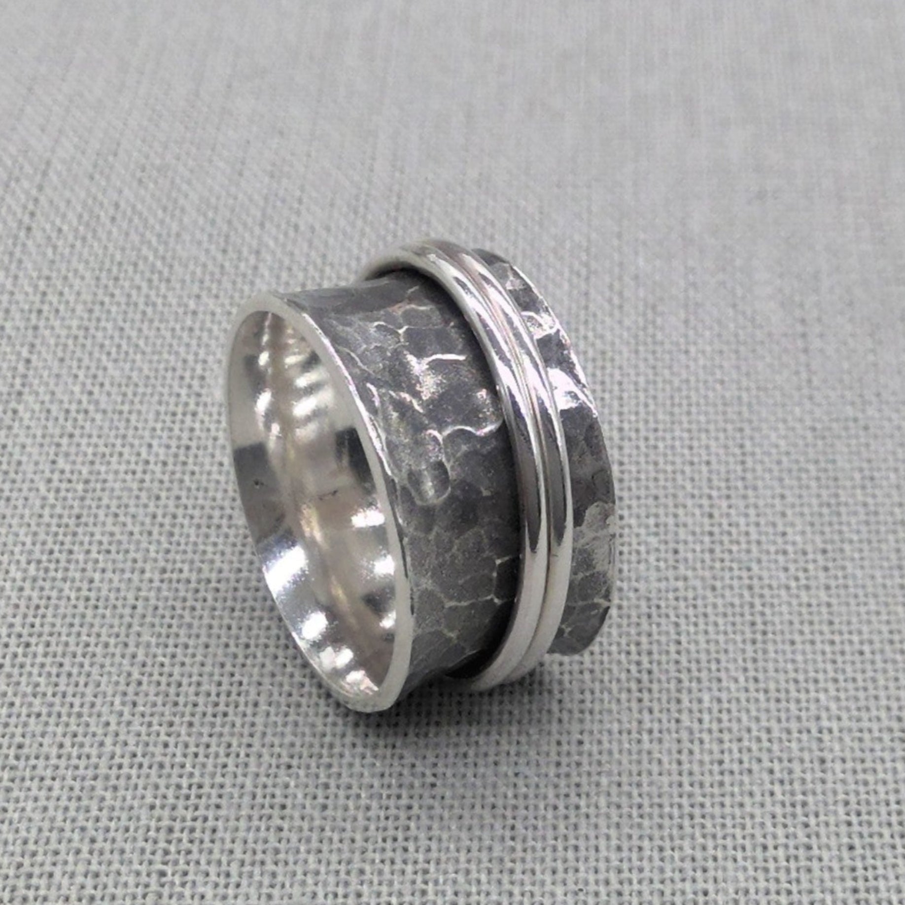 Hammered silver spinner ring