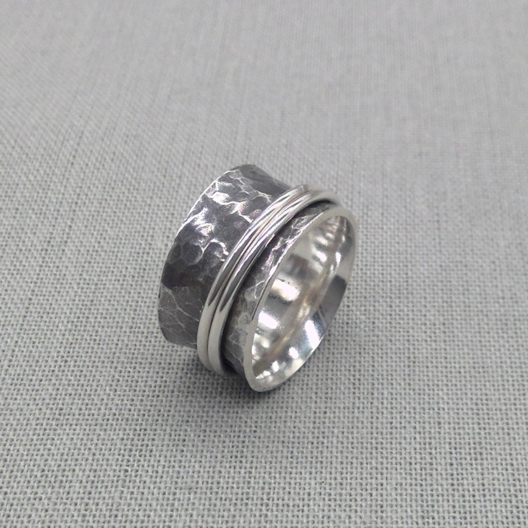 Hammered silver spinner ring