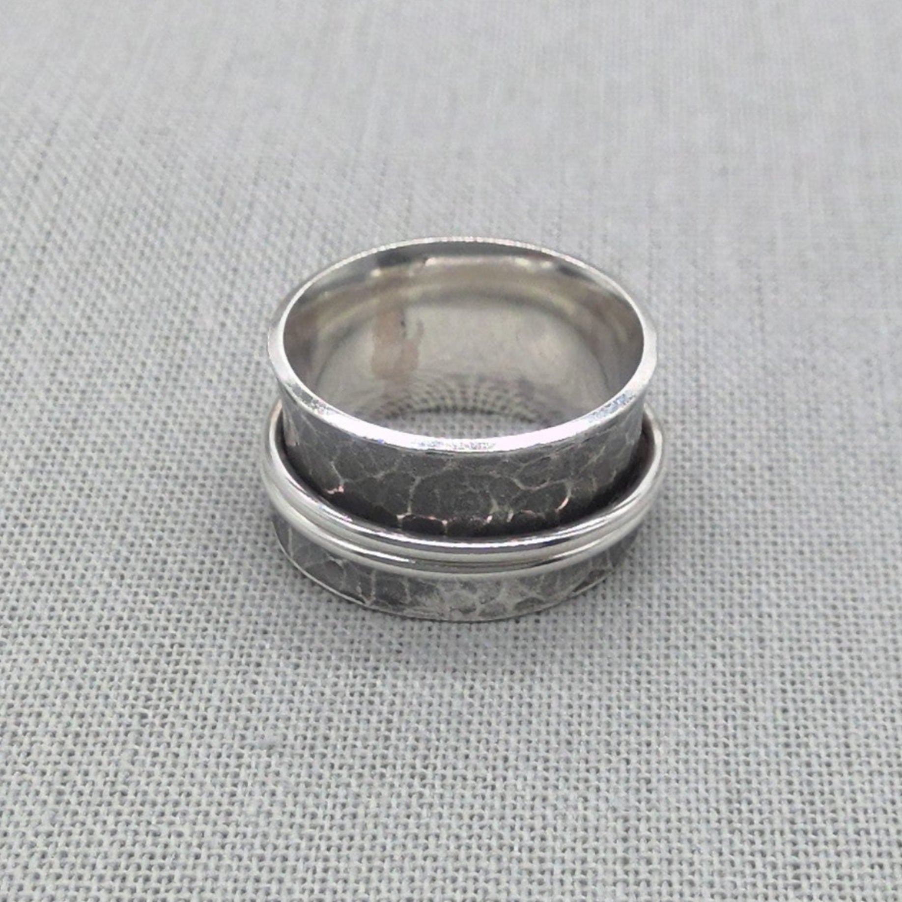 Hammered silver spinner ring