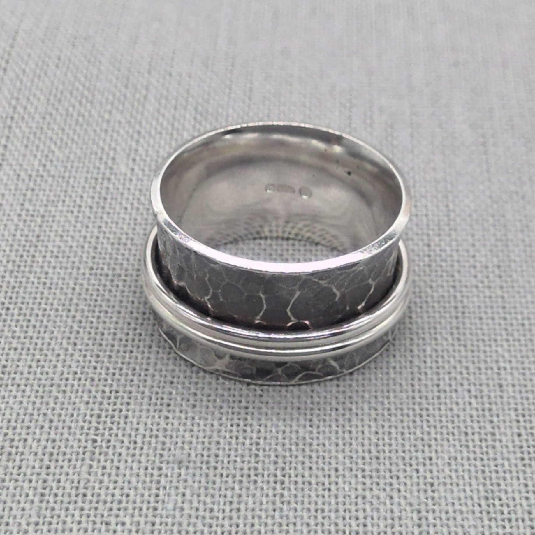 Hammered silver spinner ring