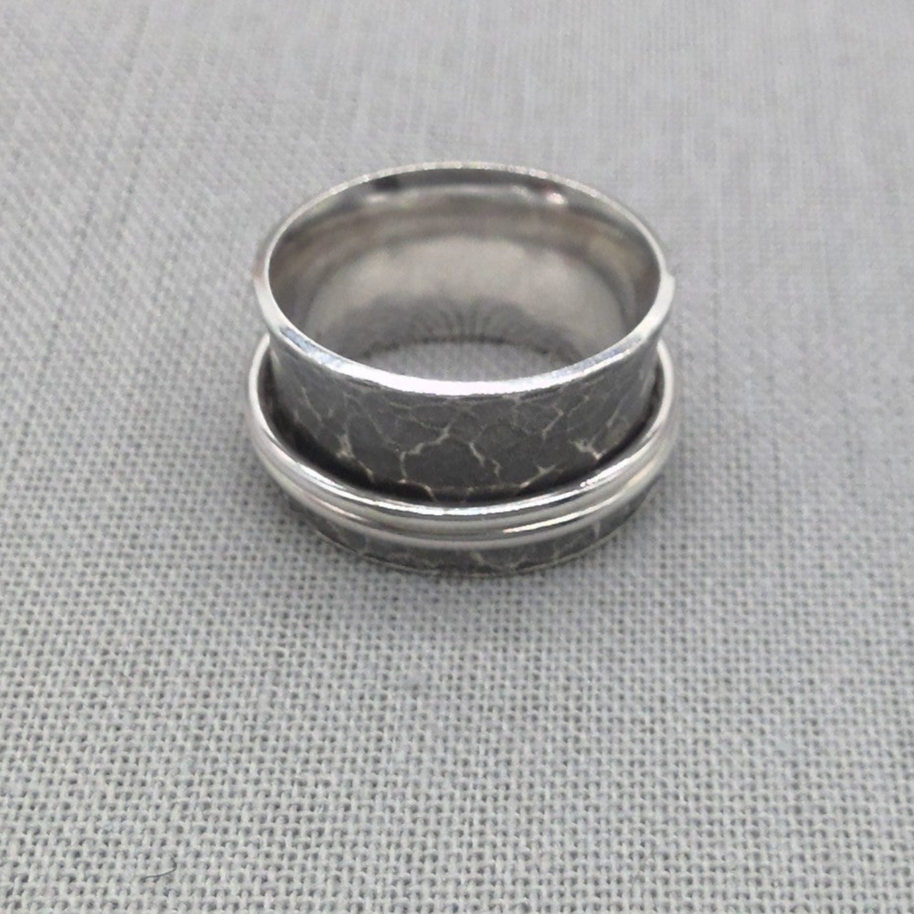 Hammered silver spinner ring