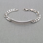 Chunky recycled silver curb chain ID bracelet with clasp on fabric