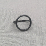 Front view of black oxidised circle silver ring