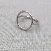 Front view of polished silver circle ring