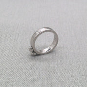 Side profile of sculptural double ball silver ring band