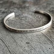 Silver bracelet with engraved text 