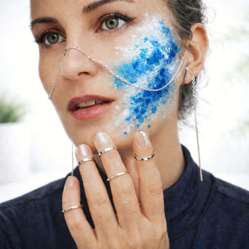 Model wearing Gladiator collection silver ring near face
