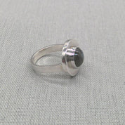 Front view of labradorite cabochon set in recycled silver ring