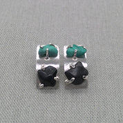 Front view of malachite and obsidian silver stud earrings