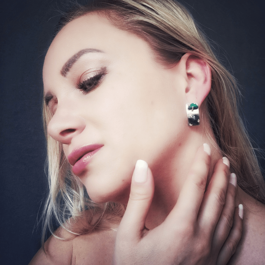 Model wearing malachite and obsidian recycled silver earrings