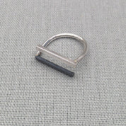 Side view of minimalist recycled 925 silver ring showing wire detail