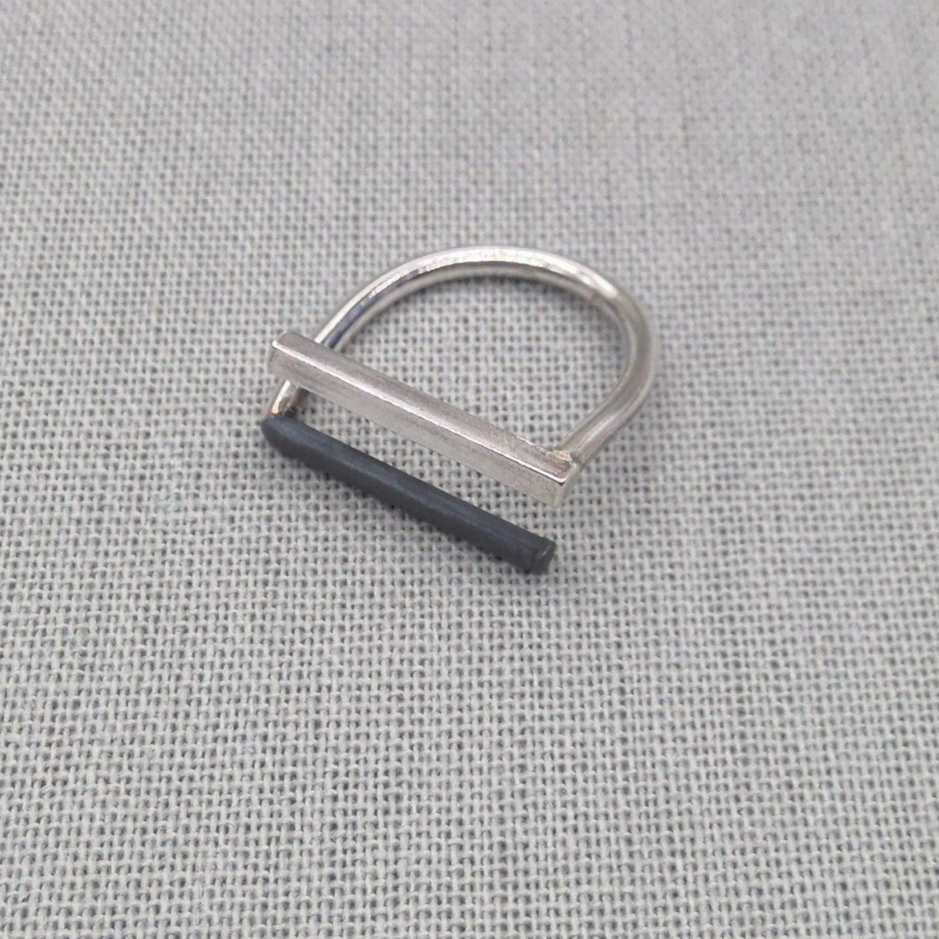 Side view of minimalist recycled 925 silver ring showing wire detail