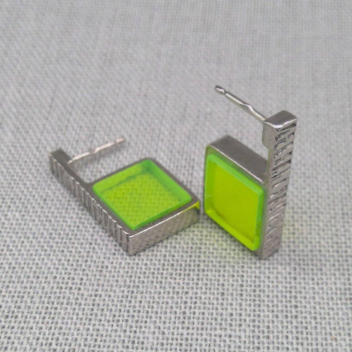 Neon green hammered recycled silver earrings, full pair view