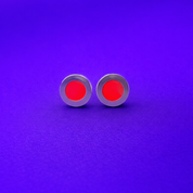 Red neon resin silver studs glowing under UV light