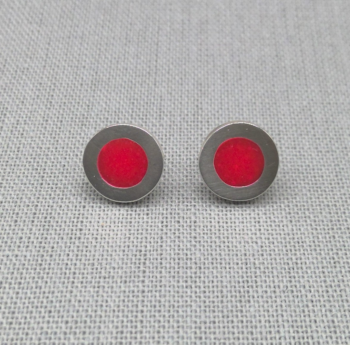 Additional angle of red neon resin recycled silver studs