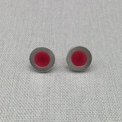 Alternate close-up of red neon resin silver stud earrings