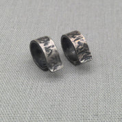 Pair of oxidised textured recycled silver ear cuffs, full view
