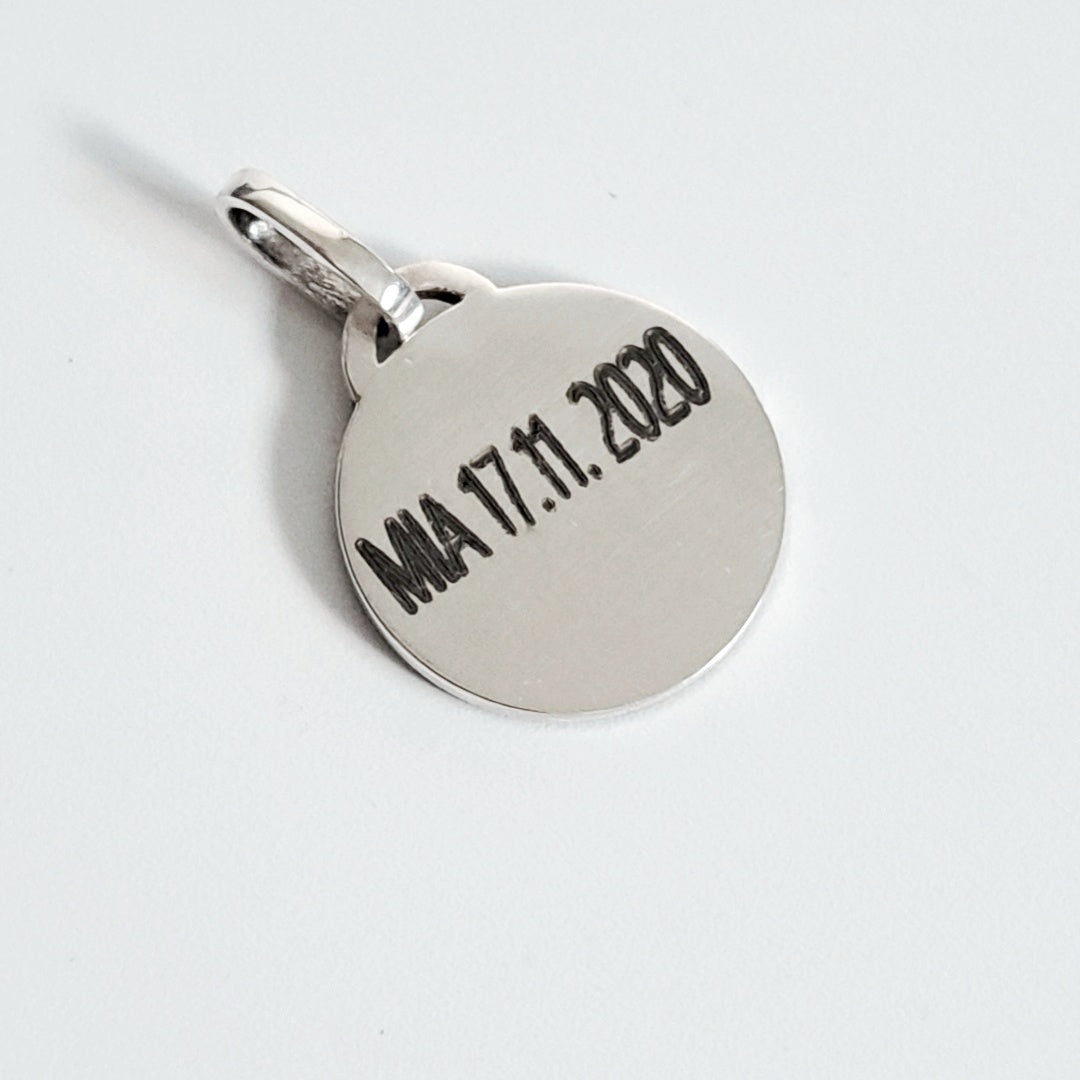 Back of pendant showing engraved date and personalisation