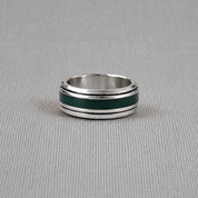 Personalised recycled silver spinning ring with green resin band on fabric