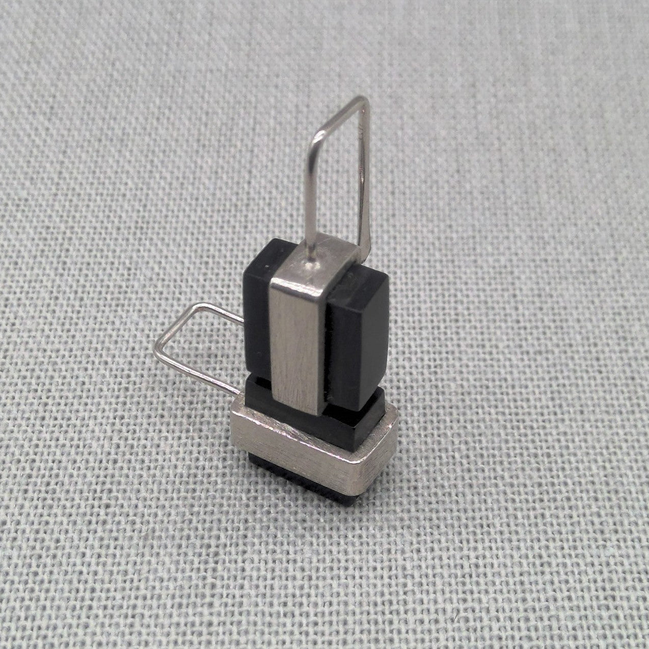 Front view of single Perspex and recycled silver earring
