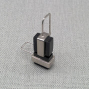 Front view of single Perspex and recycled silver earring