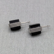 Side by side view of Perspex and silver block earrings