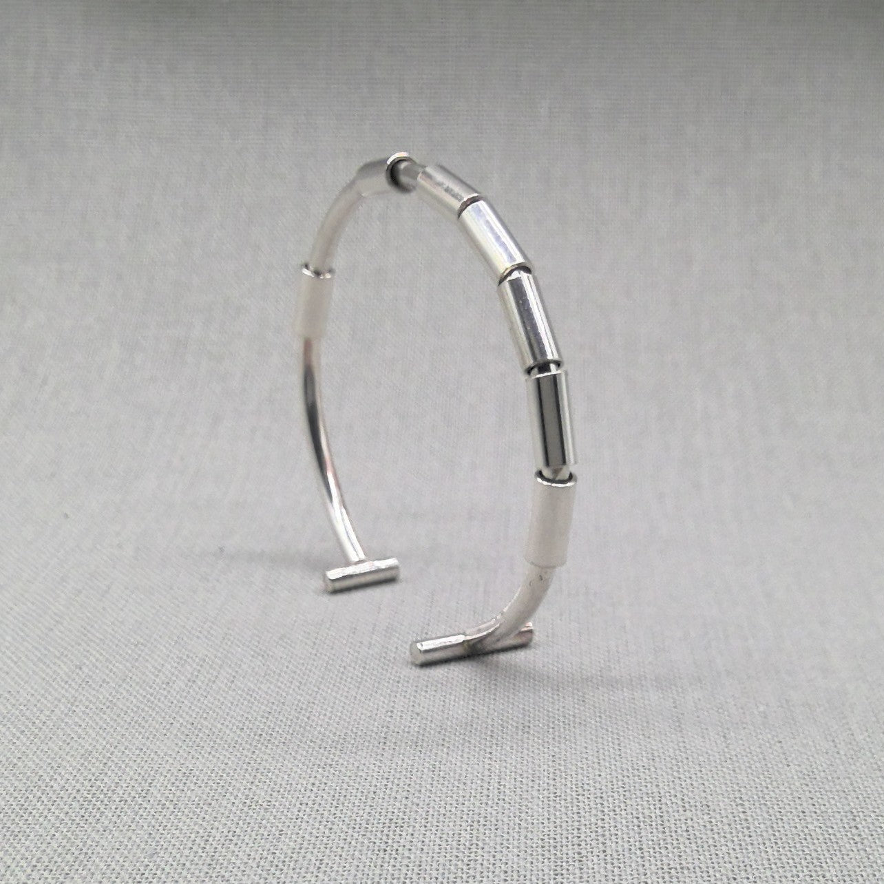 Angled detail shot of recycled silver bangle joint construction