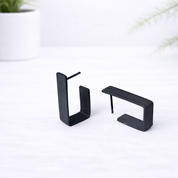 Minimalistische Silberohrringe aus der Kollektion Black &amp; White