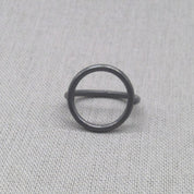 Sculptural circle recycled silver ring in black oxidised finish, full view