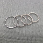 Alternate flat lay of recycled silver stacking rings