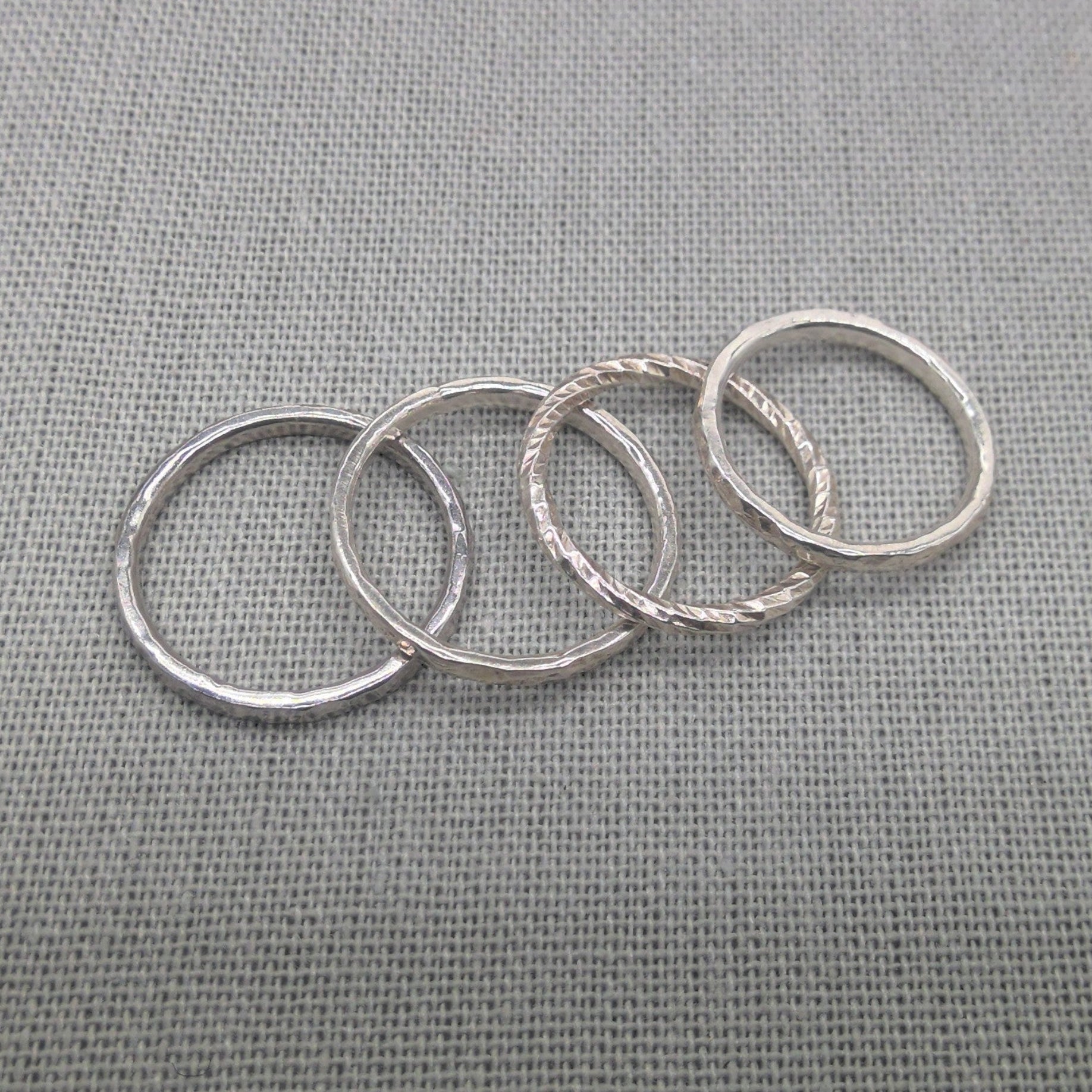 Alternate flat lay of recycled silver stacking rings