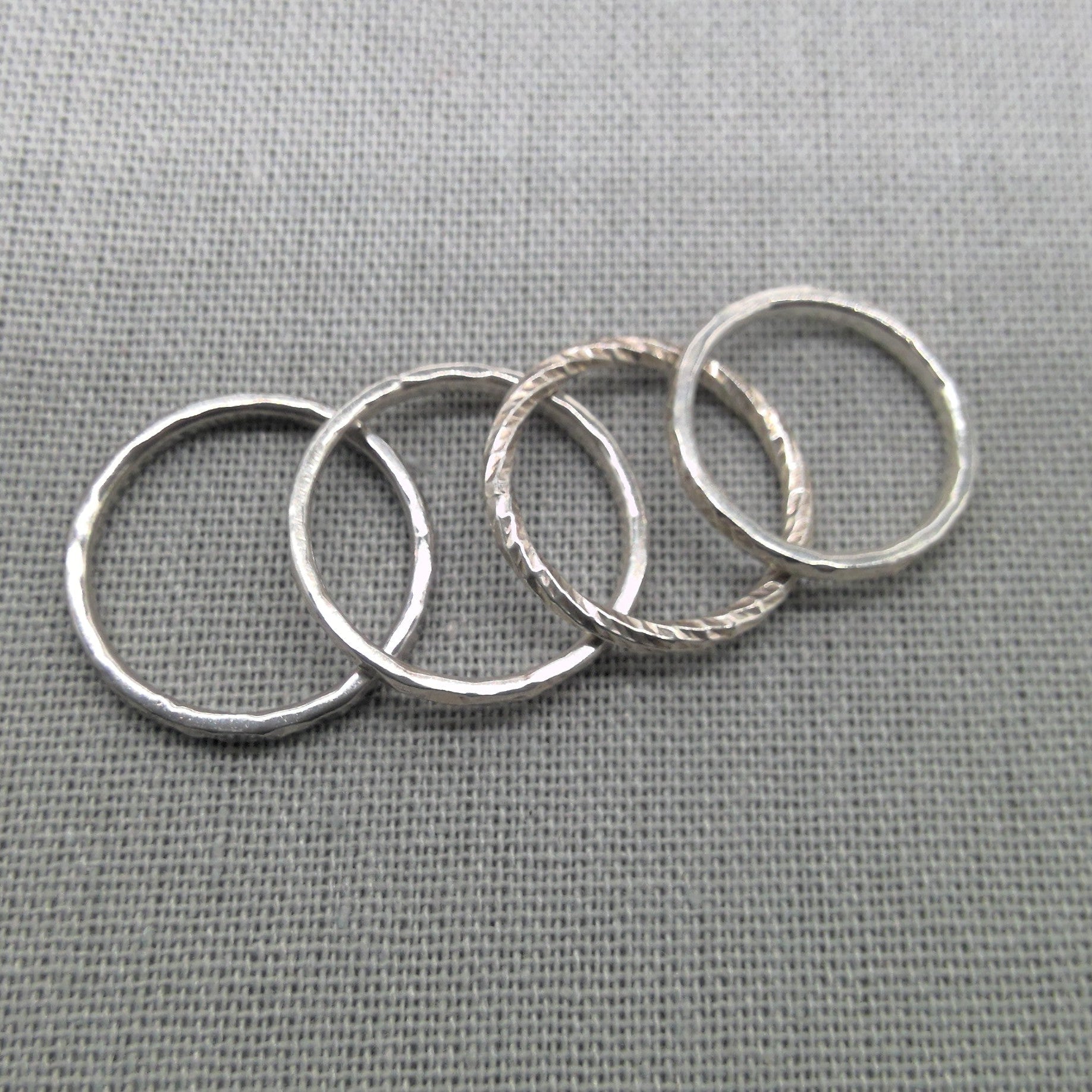 Set of textured recycled silver stacking rings, full view