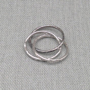 Triple band hammered recycled silver ring, interlocking design, full view