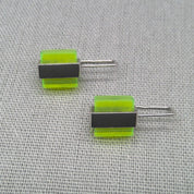 Side view of two-tone neon Perspex stud earrings